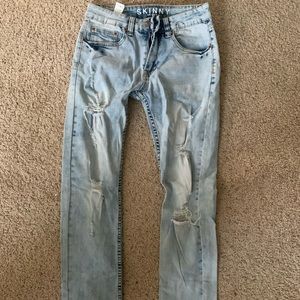 Blue ripped skinny jeans